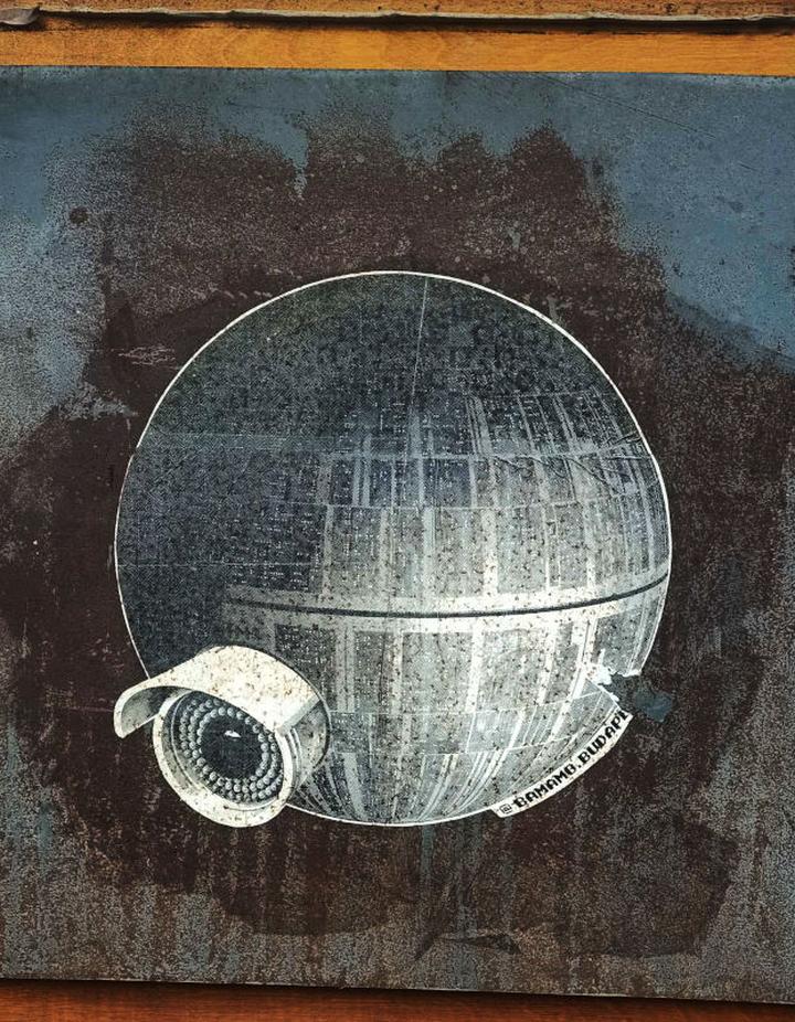 A collage of the death star and a security camera
