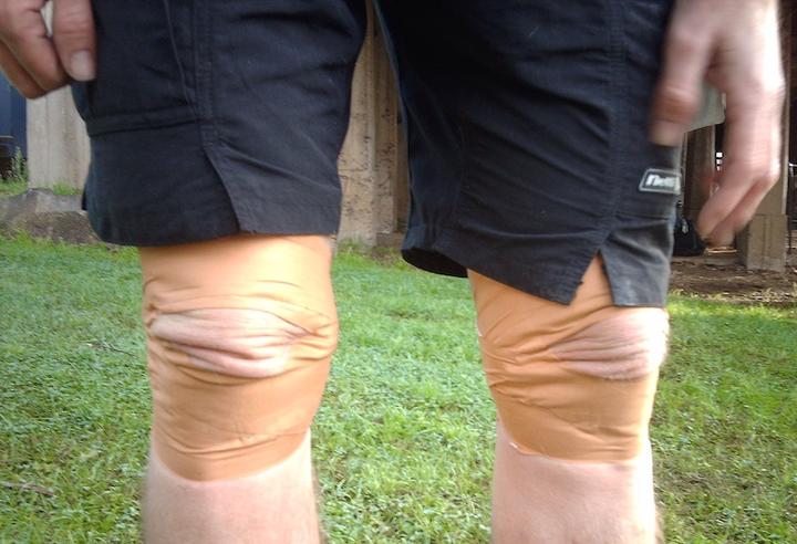 Matt's buggered knees wrapped in sticky tape