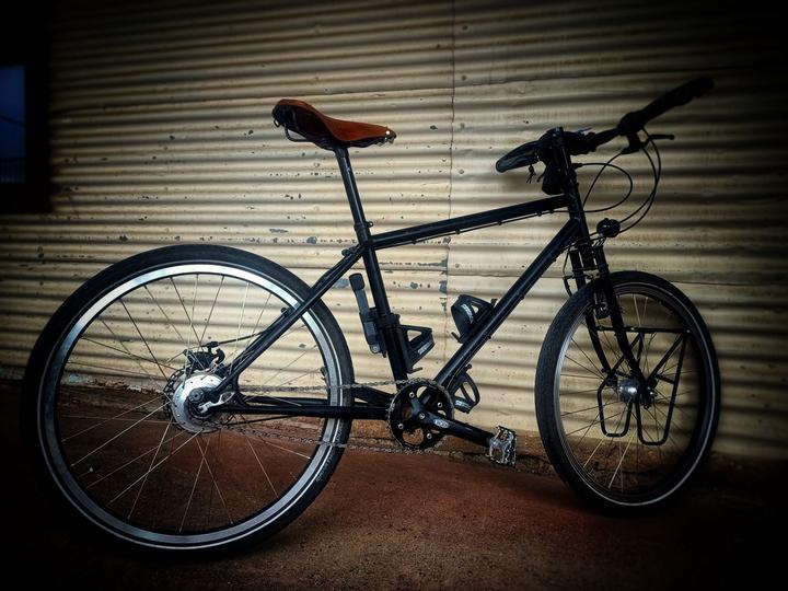 My as yet, un-named bicycle. Built by Thorn. Just a boring looking bike albeit robust, black, flat handlebarred and made of steel