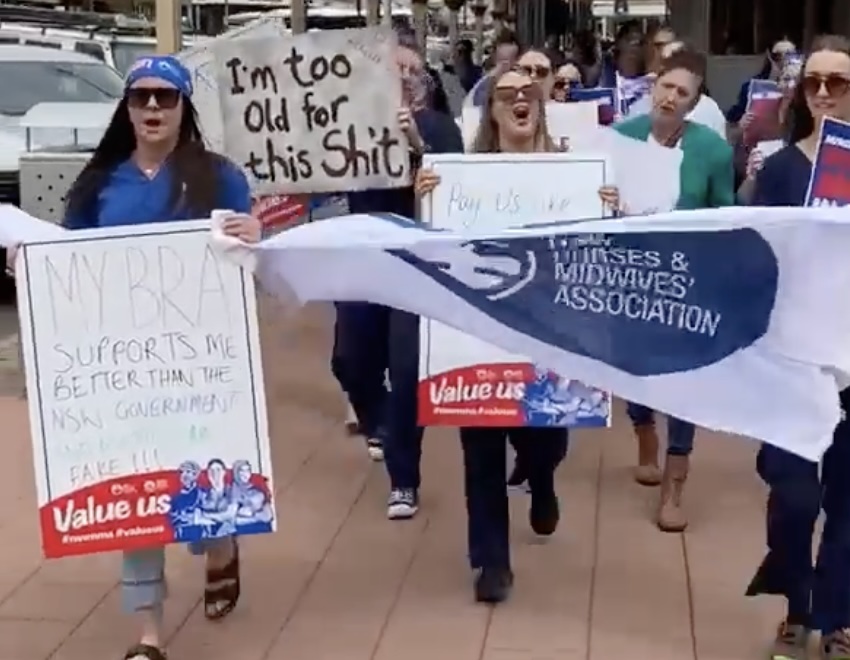 A nurse strike here in Broken Hill, us lot marching with our banners. My banner reads, I'm too old for this shit